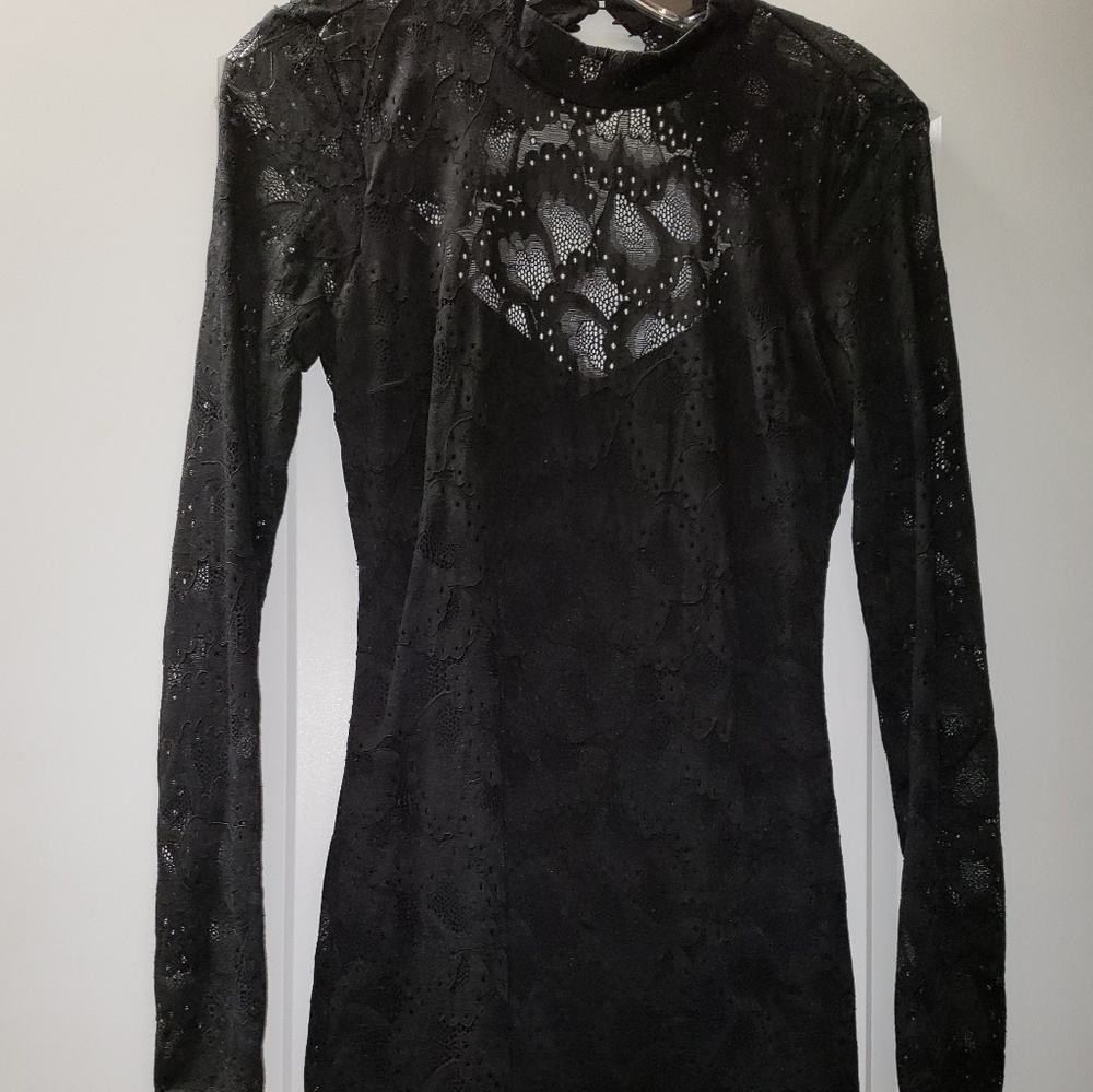 Size small fitted lace, open back Bebe dress